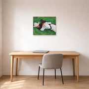 Unframed poster print of John Singer Sargent's Two Girls on a Lawn displayed on a wall in an office