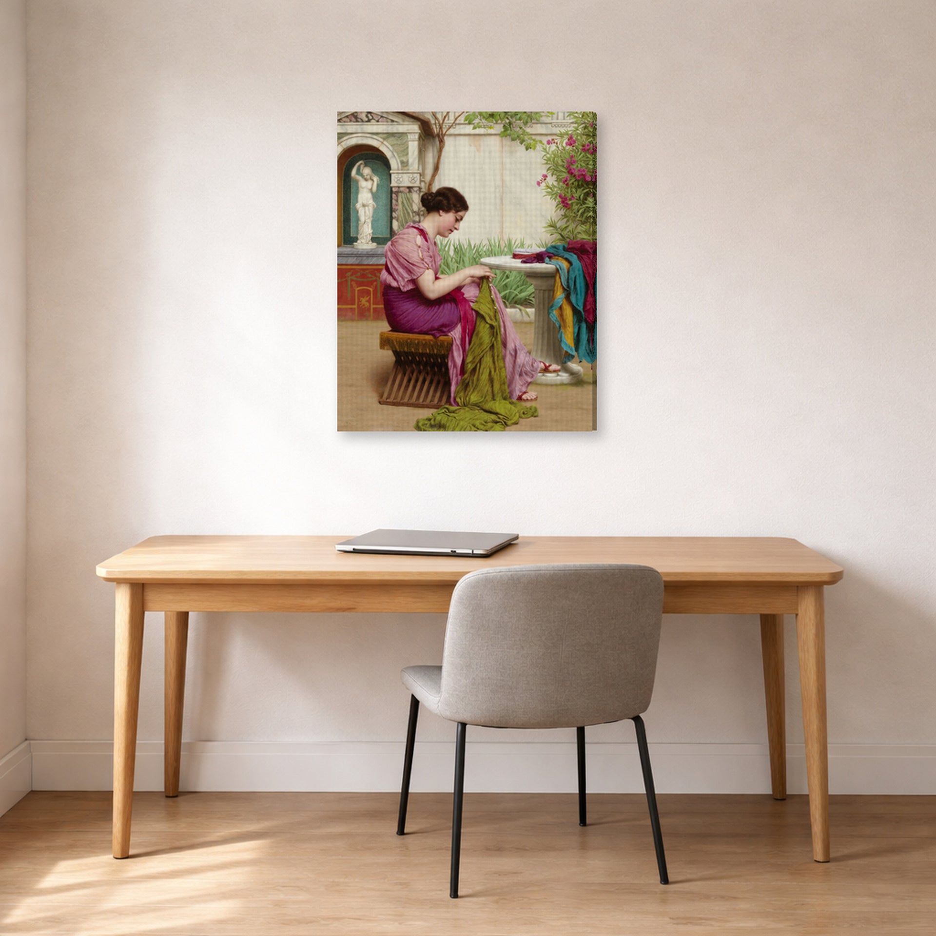 Gallery-wrapped canvas print of John William Godward's A Stitch in Time displayed on a wall in an office