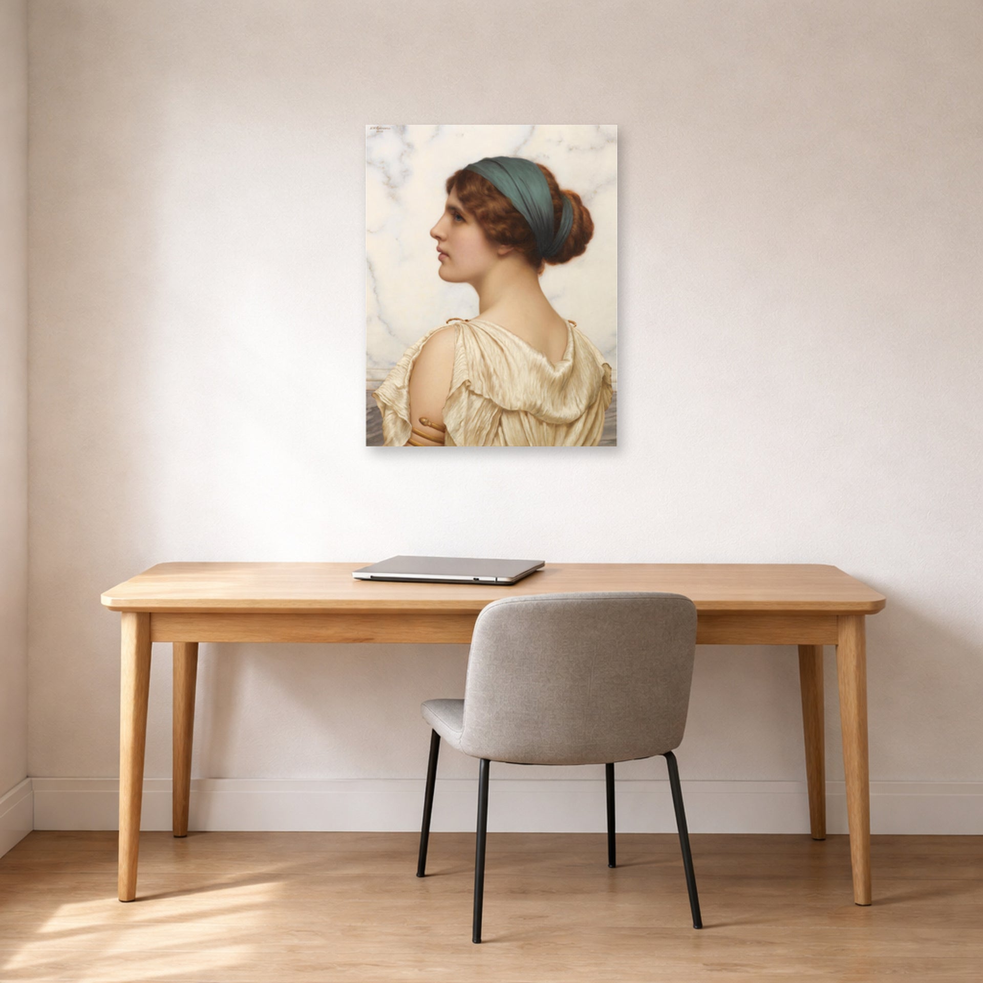 Unframed poster print of John William Godward's Atalanta displayed on a wall in an office