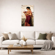 Unframed poster print of John William Godward's Crytilla displayed on a wall in a living room