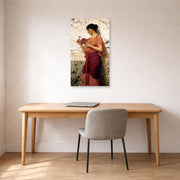Unframed poster print of John William Godward's Crytilla displayed on a wall in an office