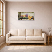 Gallery-wrapped canvas print of John William Godward's The Day Dream displayed on a wall in a living room