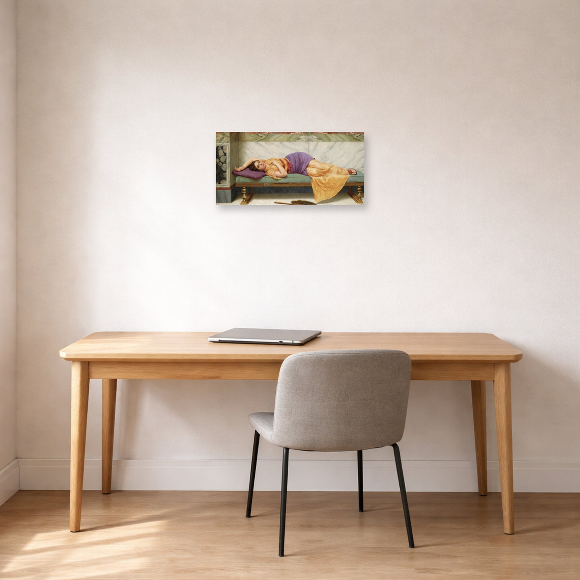 Unframed poster print of John William Godward's The Day Dream displayed on a wall in an office