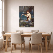 Gallery-wrapped canvas print of John William Waterhouse's A Mermaid displayed on a wall in a dining room