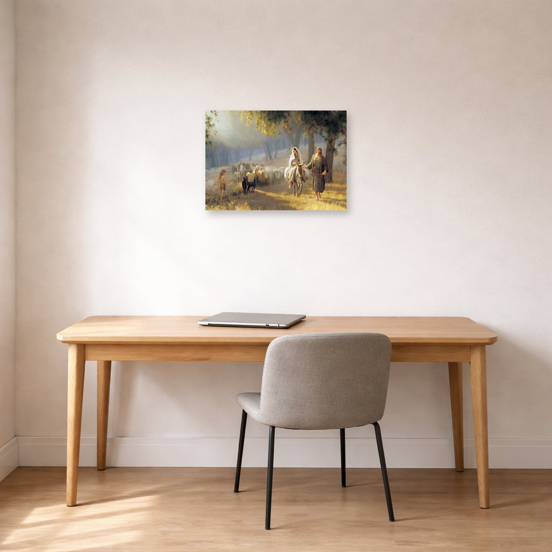 Unframed poster print of Joseph Brickey's 'Road to Bethlehem' displayed on a wall in a office