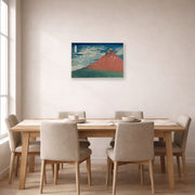 Unframed poster print of Katsushika Hokusai's Fine Wind, Clear Weather displayed on a wall in a dining room