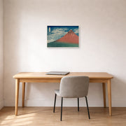 Unframed poster print of Katsushika Hokusai's Fine Wind, Clear Weather displayed on a wall in a office