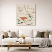 Gallery-wrapped canvas print of Katsushika Hokusai's Myriad Grasses Shell displayed on a wall in a living room