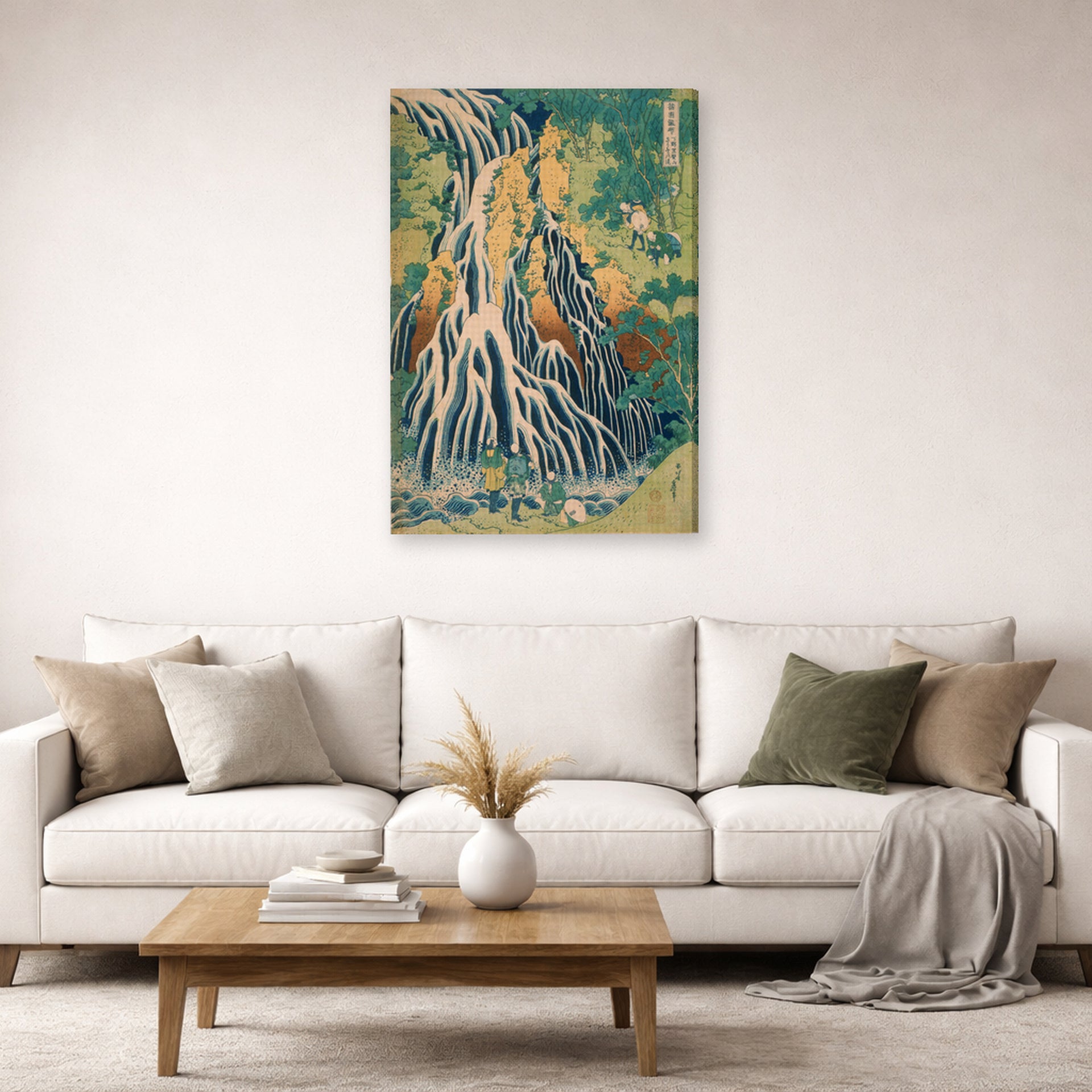 Gallery-wrapped canvas print of Katsushika Hokusai's Pilgrims at Kirifuri Waterfall on Mount Kurokami in Shimotsuke Province displayed on a wall in a living room