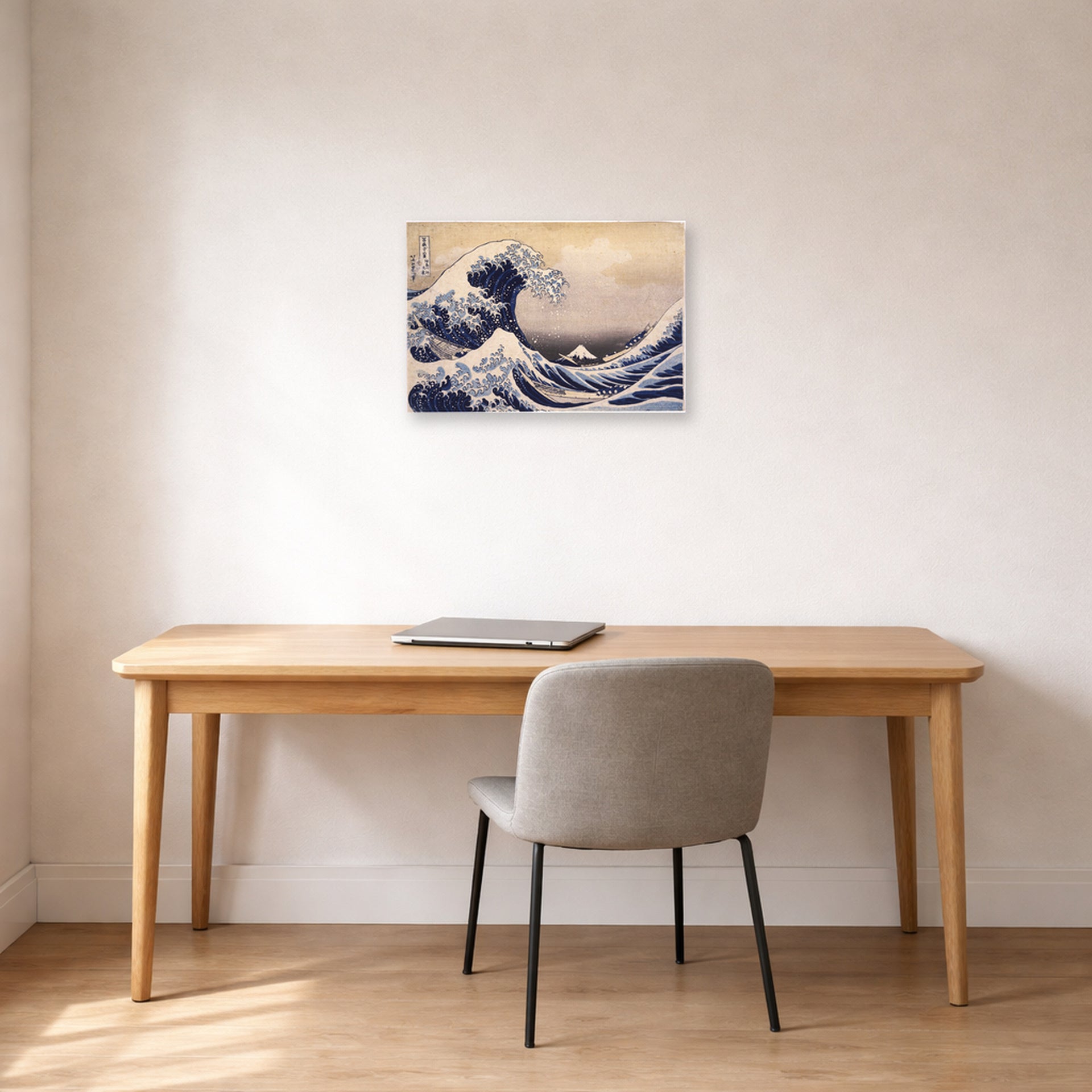 Unframed poster print of Katsushika Hokusai's The Great Wave Off the Coast of Kanagawa displayed on a wall in a office