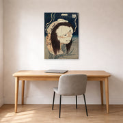 Gallery-wrapped canvas print of Katsushika Hokusai's The Lantern Ghost, Iwa displayed on a wall in a office