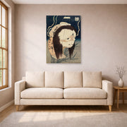 Unframed poster print of Katsushika Hokusai's The Lantern Ghost, Iwa displayed on a wall in a living room