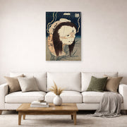 Unframed poster print of Katsushika Hokusai's The Lantern Ghost, Iwa displayed on a wall in a living room