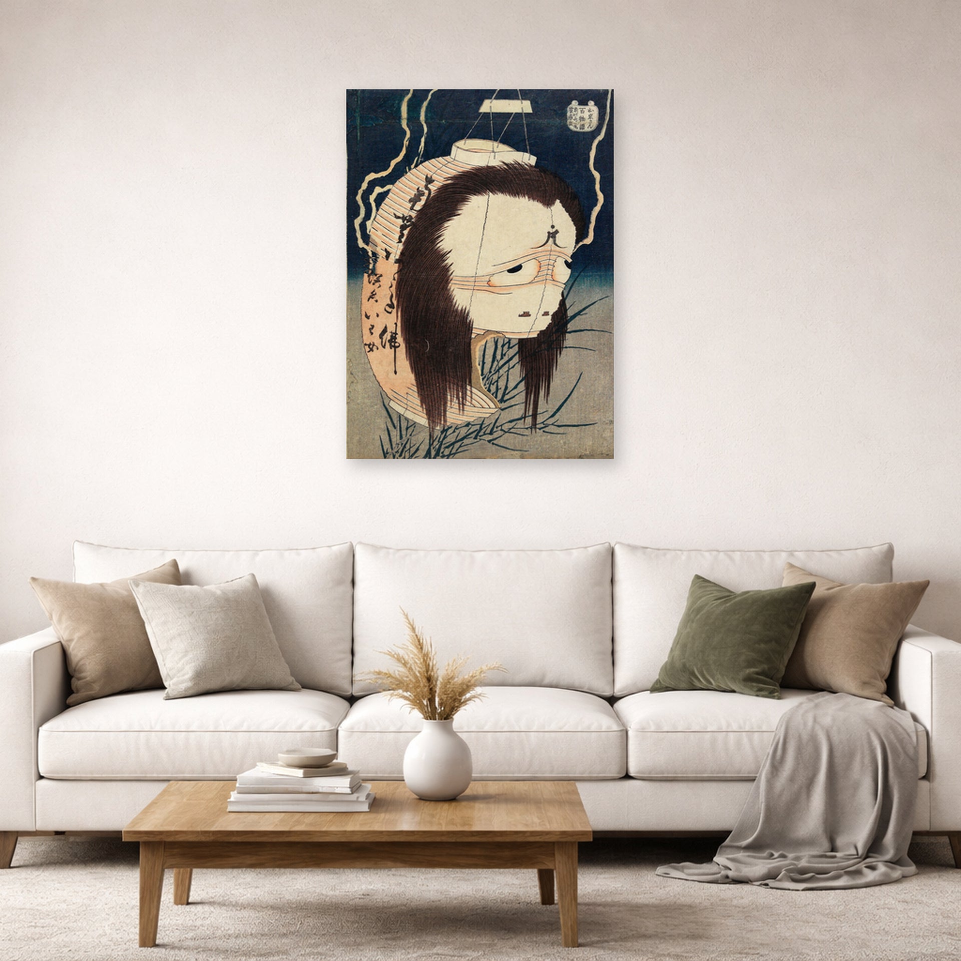 Unframed poster print of Katsushika Hokusai's The Lantern Ghost, Iwa displayed on a wall in a living room