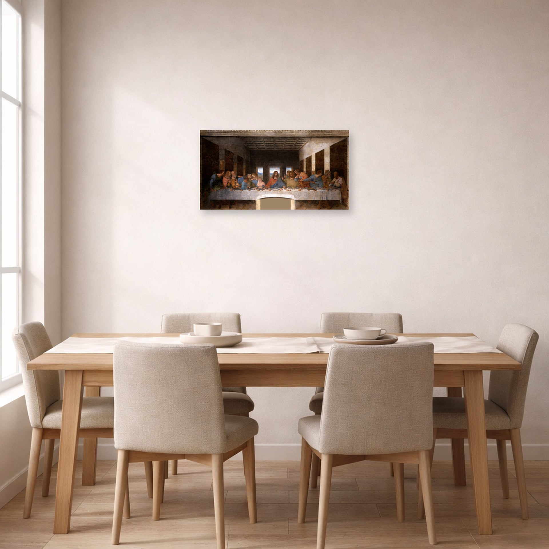Unframed poster print of Leonardo da Vinci's The Last Supper displayed on a wall in a dining room