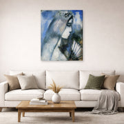 Gallery-wrapped canvas print of Marc Chagall's Bride with a Fan displayed on a wall in a living room