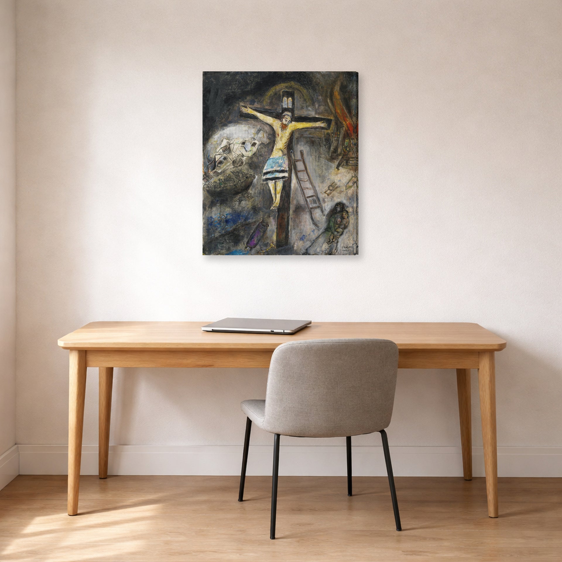 Gallery-wrapped canvas print of Marc Chagall's Crucifixion displayed on a wall in an office