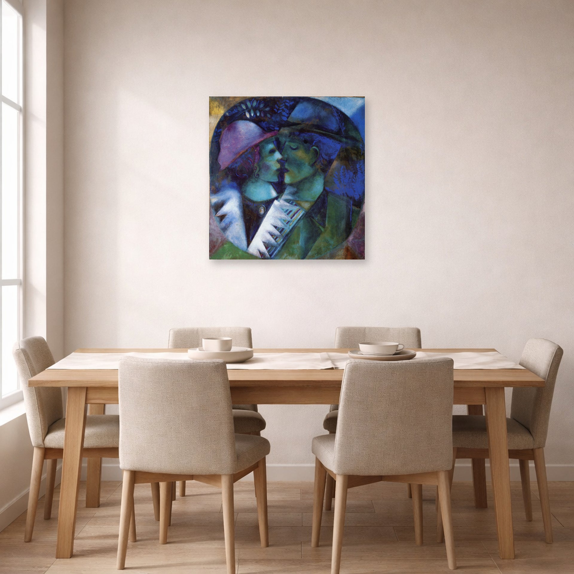 Unframed poster print of Marc Chagall's Green Lovers displayed on a wall in a dining room