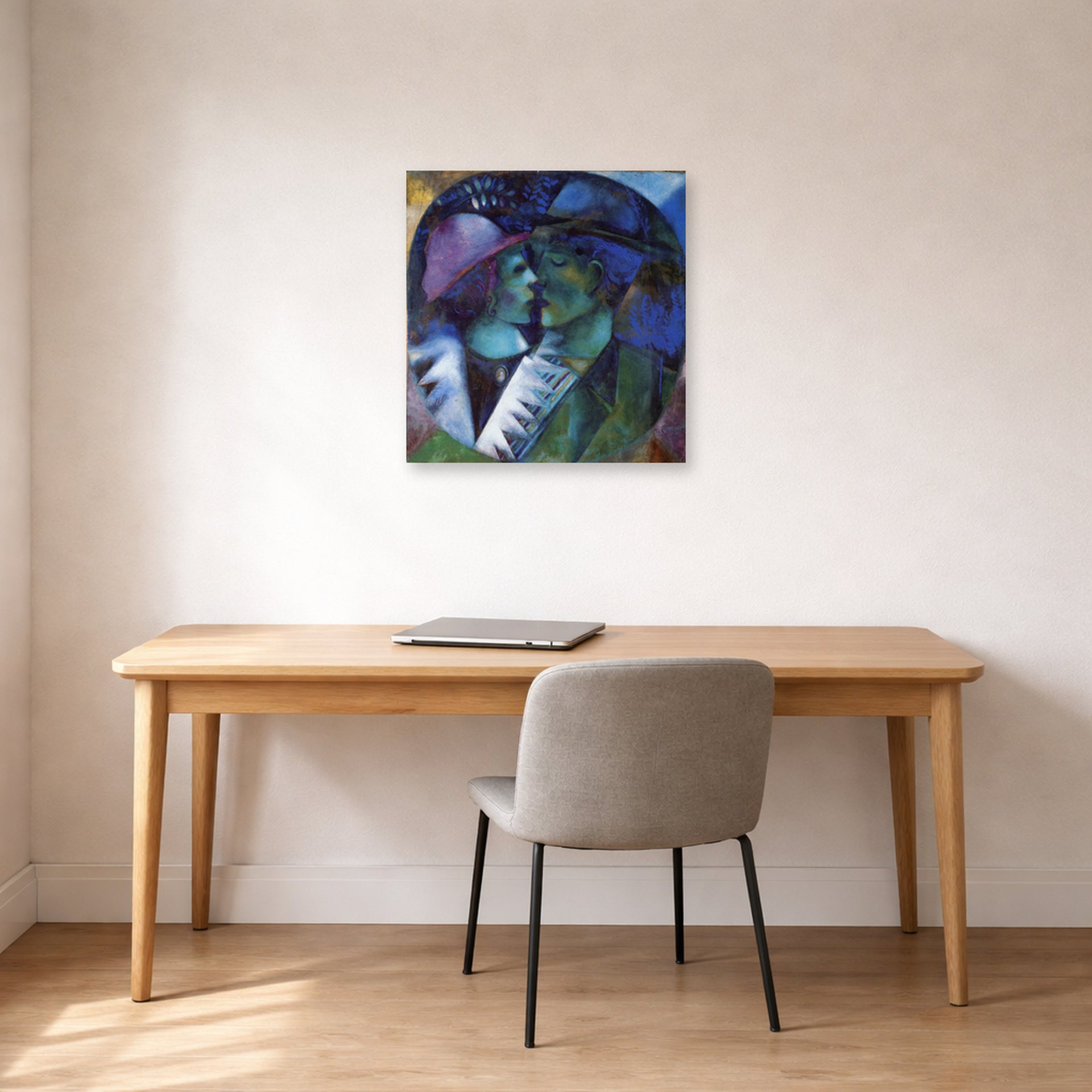 Unframed poster print of Marc Chagall's Green Lovers displayed on a wall in an office