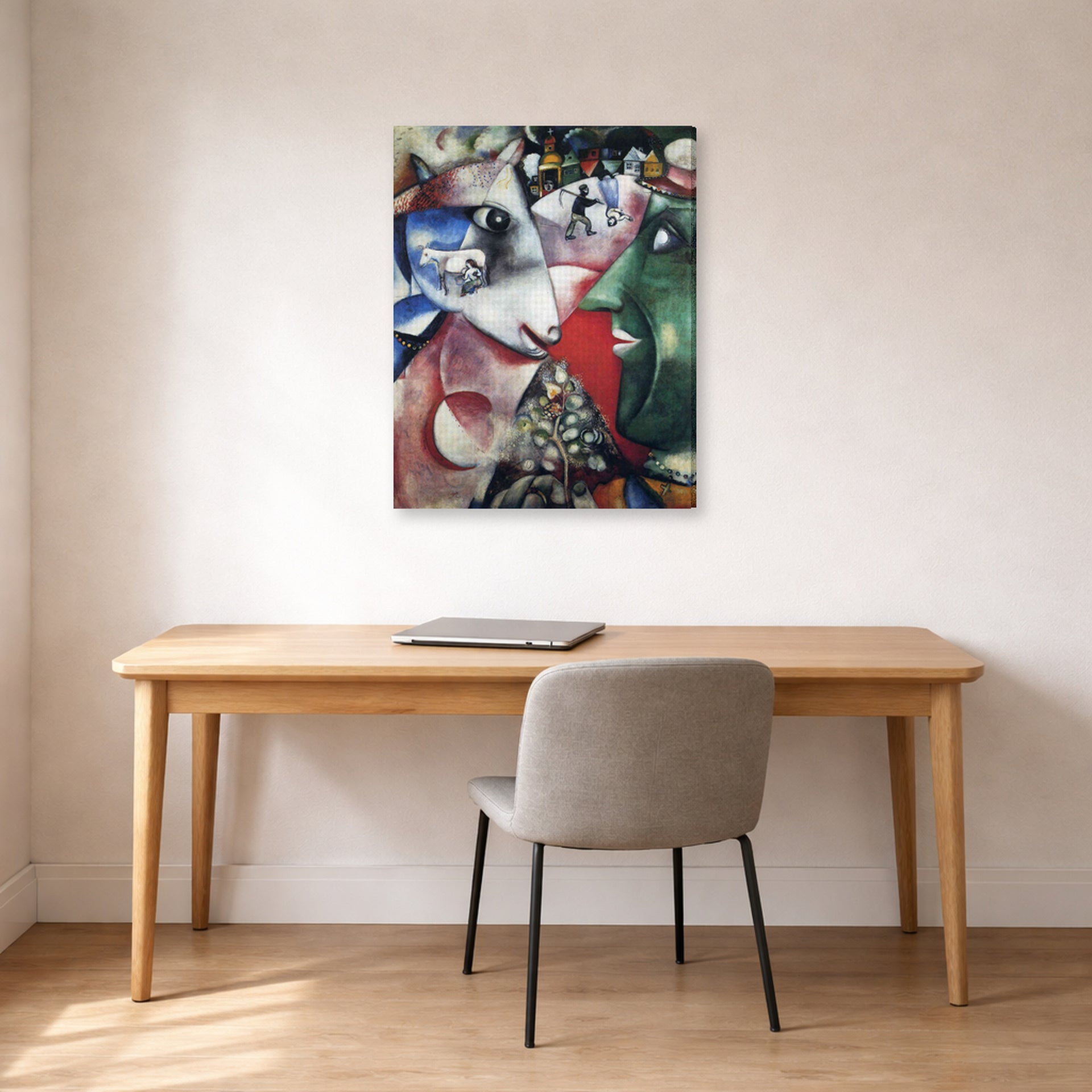 Gallery-wrapped canvas print of Marc Chagall's I and the Village displayed on a wall in an office