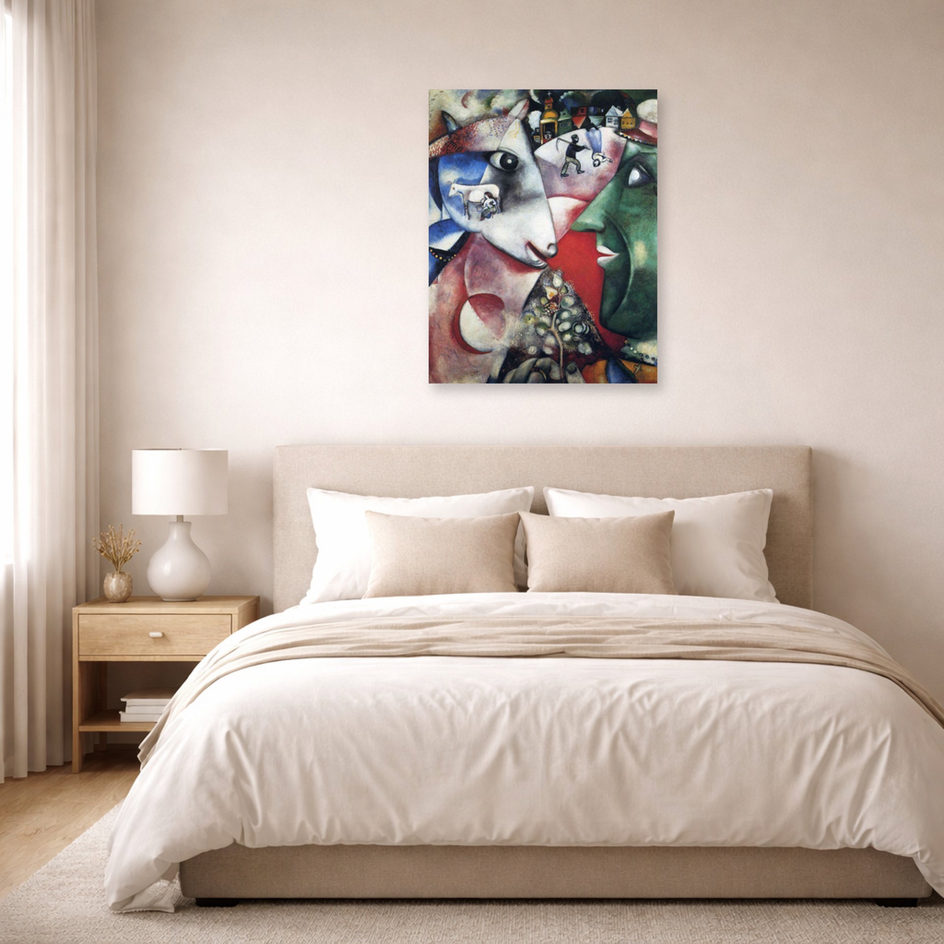 Unframed poster print of Marc Chagall's I and the Village displayed on a wall in a bedroom