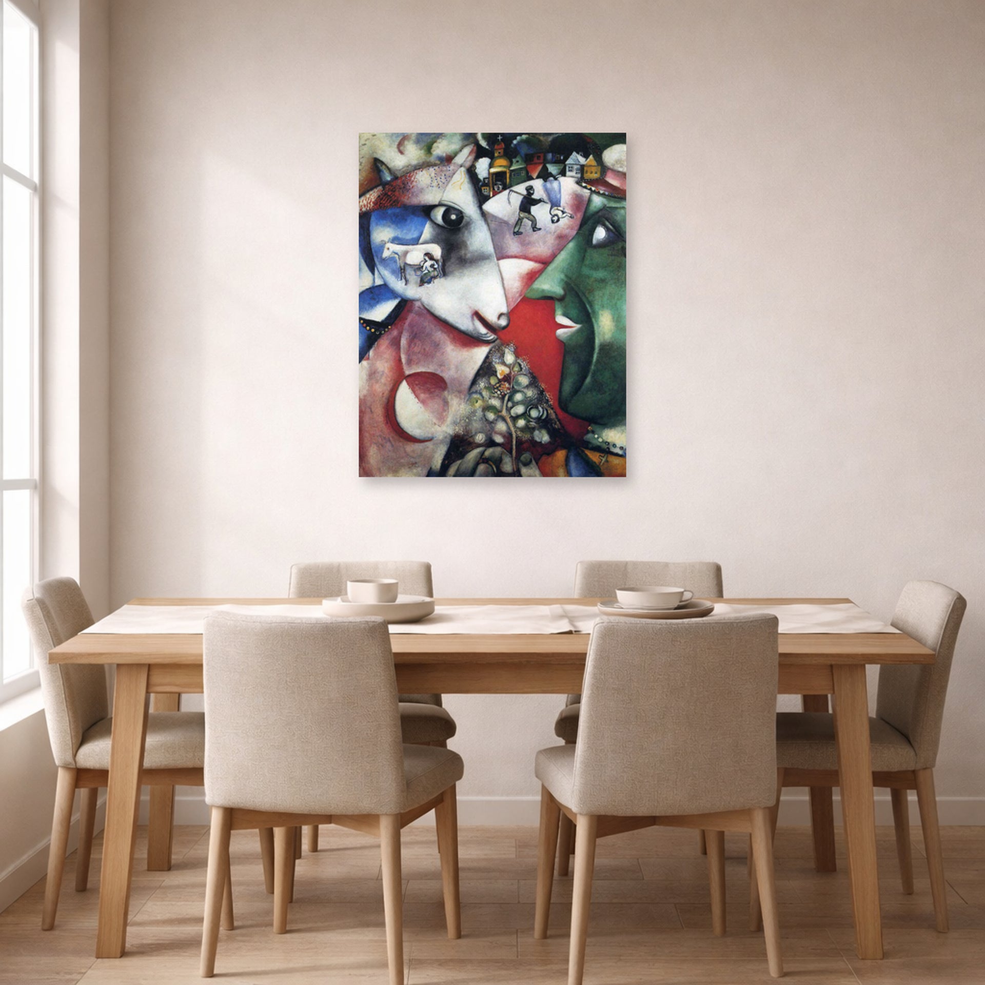 Unframed poster print of Marc Chagall's I and the Village displayed on a wall in a dining room