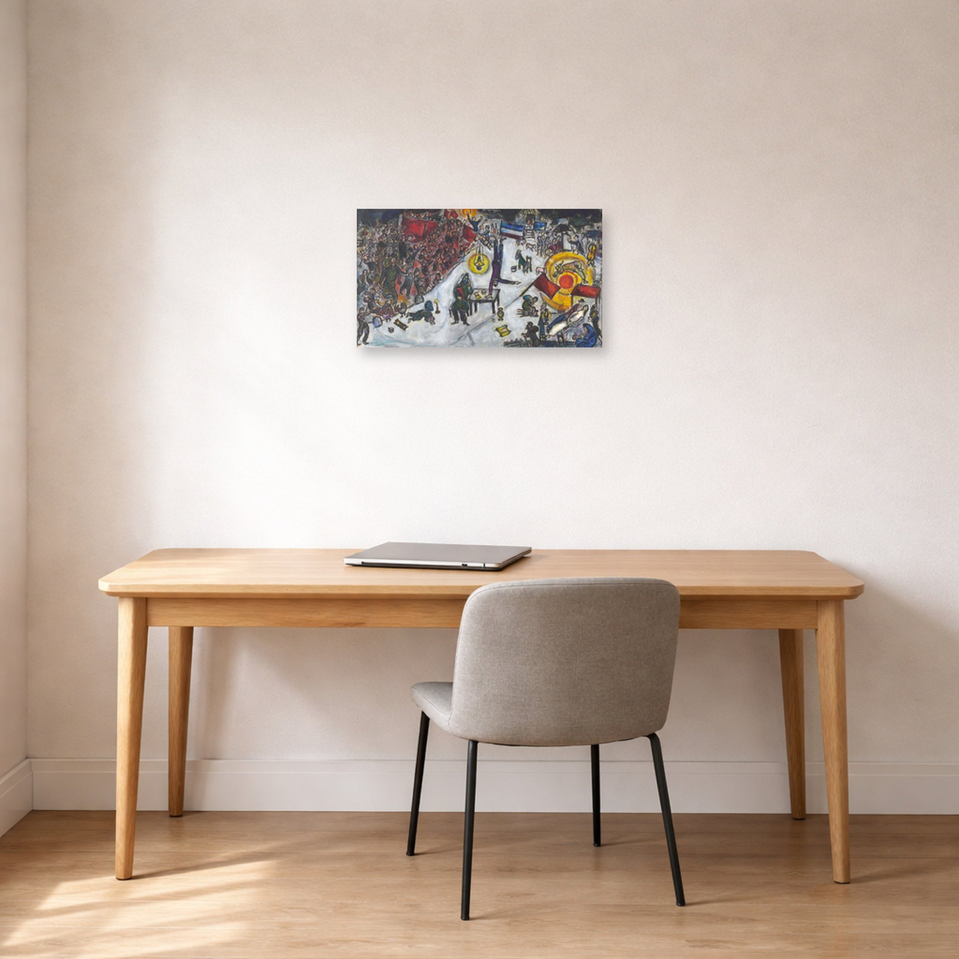 Unframed poster print of Marc Chagall's La Revolotion displayed on a wall in an office