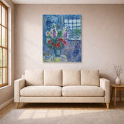 Gallery-wrapped canvas print of Marc Chagall's Latelier displayed on a wall in a living room