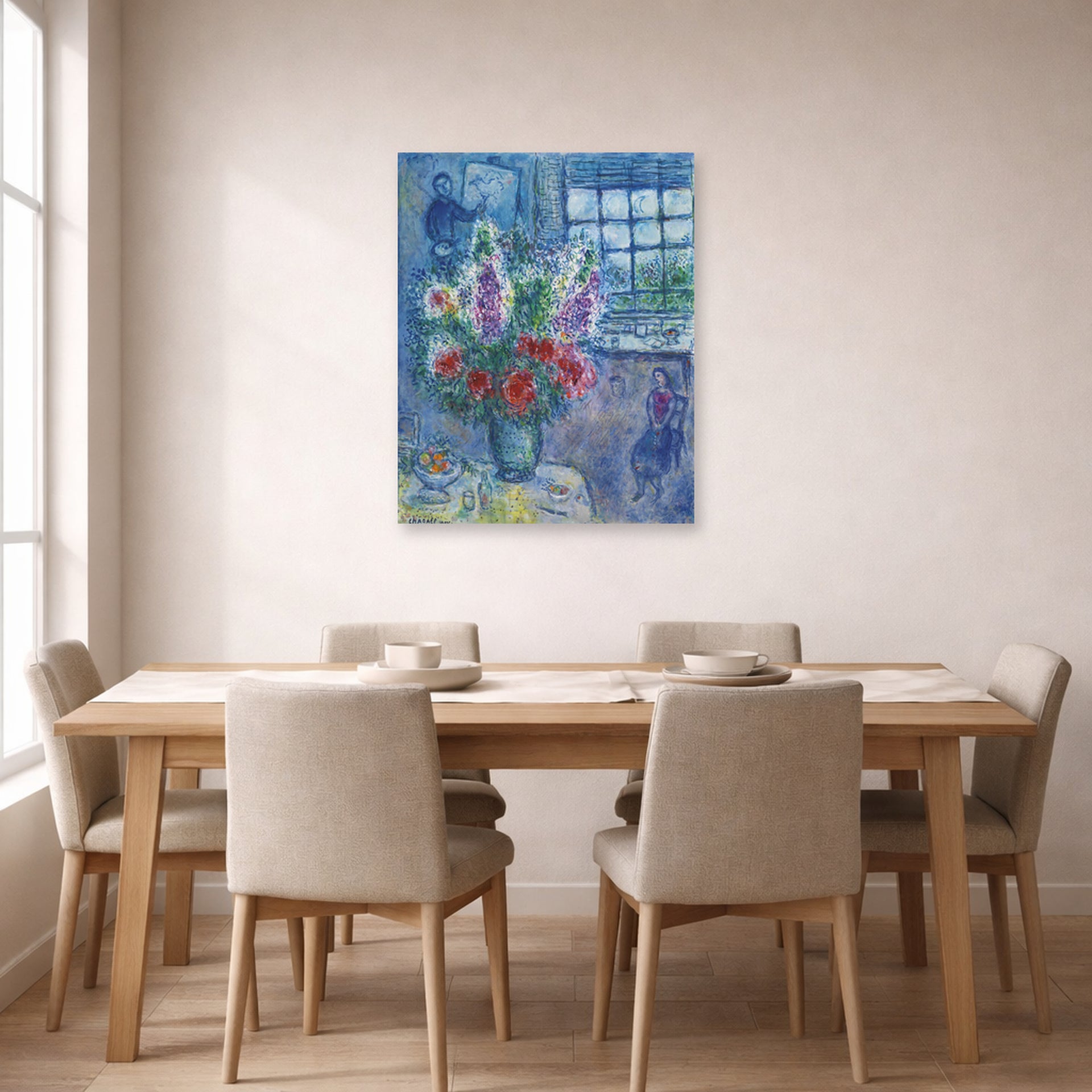 Unframed poster print of Marc Chagall's Latelier displayed on a wall in a dining room