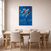 Unframed poster print of Marc Chagall's Le Bouquet Au Dessus De Vence displayed on a wall in a dining room