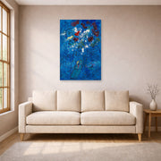 Unframed poster print of Marc Chagall's Le Bouquet Au Dessus De Vence displayed on a wall in a living room