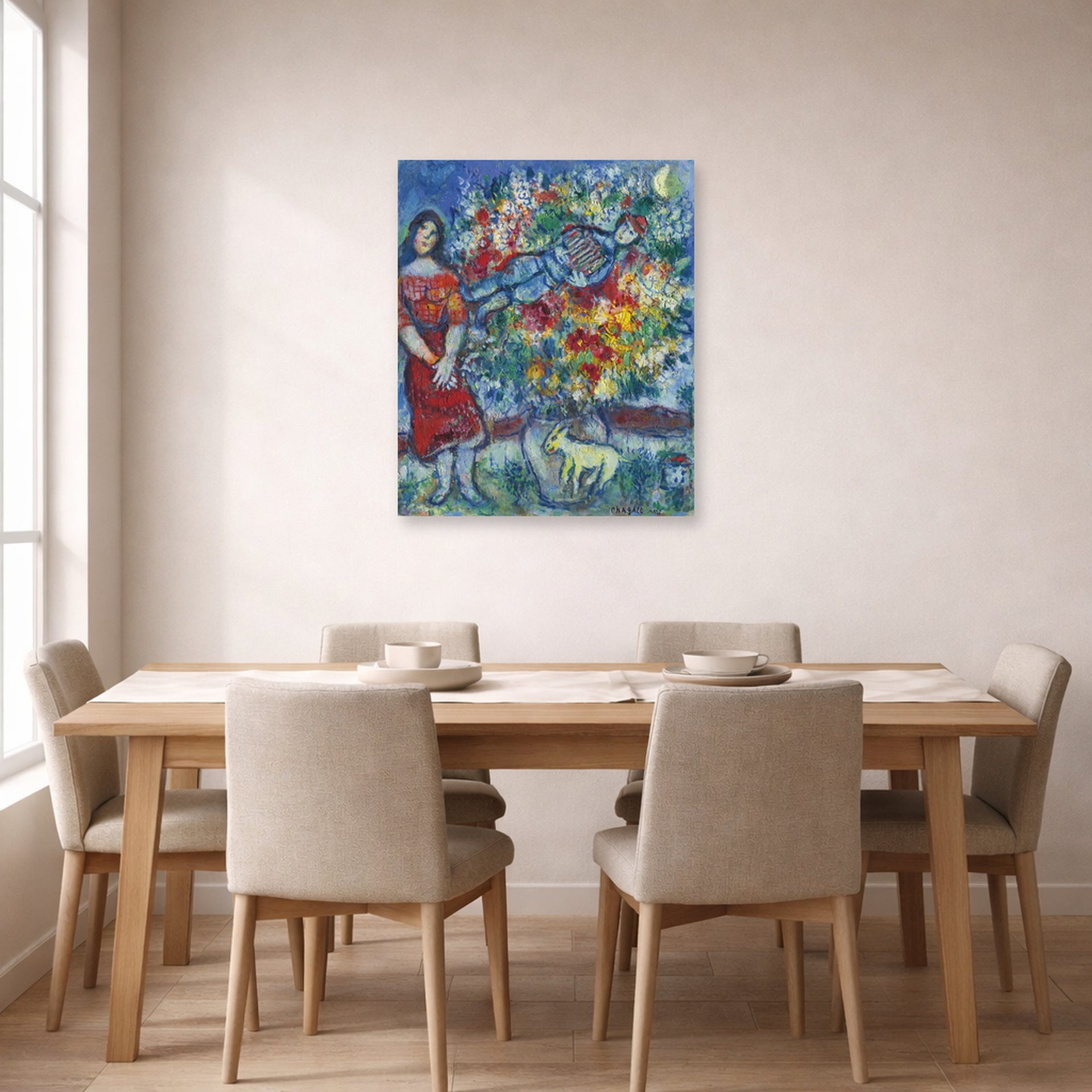 Unframed poster print of Marc Chagall's Le Joeur D'Accordéon displayed on a wall in a dining room