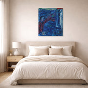 Gallery-wrapped canvas print of Marc Chagall's Le Peintre Devant Le Chevalet displayed on a wall in a bedroom