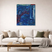 Gallery-wrapped canvas print of Marc Chagall's Le Peintre Devant Le Chevalet displayed on a wall in a living room