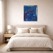 Unframed poster print of Marc Chagall's Le Peintre Devant Le Chevalet displayed on a wall in a bedroom