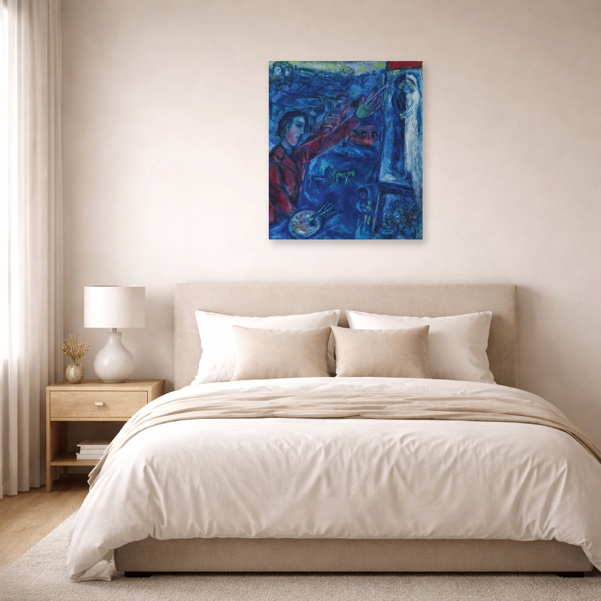 Unframed poster print of Marc Chagall's Le Peintre Devant Le Chevalet displayed on a wall in a bedroom
