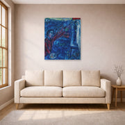 Unframed poster print of Marc Chagall's Le Peintre Devant Le Chevalet displayed on a wall in a living room