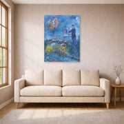 Unframed poster print of Marc Chagall's Le Peintre displayed on a wall in a living room