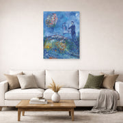 Unframed poster print of Marc Chagall's Le Peintre displayed on a wall in a living room