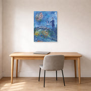 Unframed poster print of Marc Chagall's Le Peintre displayed on a wall in an office