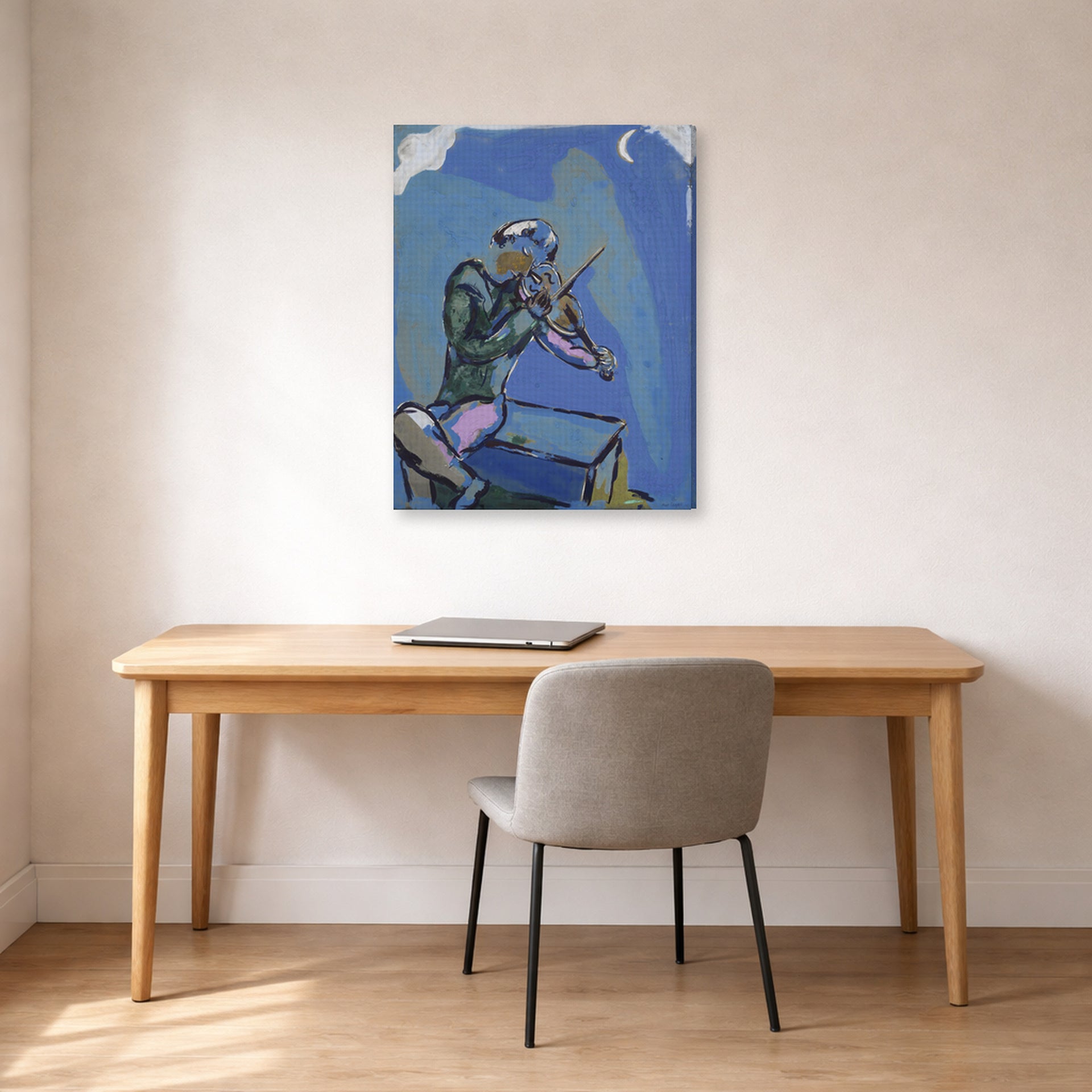 Gallery-wrapped canvas print of Marc Chagall's Le Violoniste Bleu displayed on a wall in an office