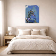 Unframed poster print of Marc Chagall's Le Violoniste Bleu displayed on a wall in a bedroom