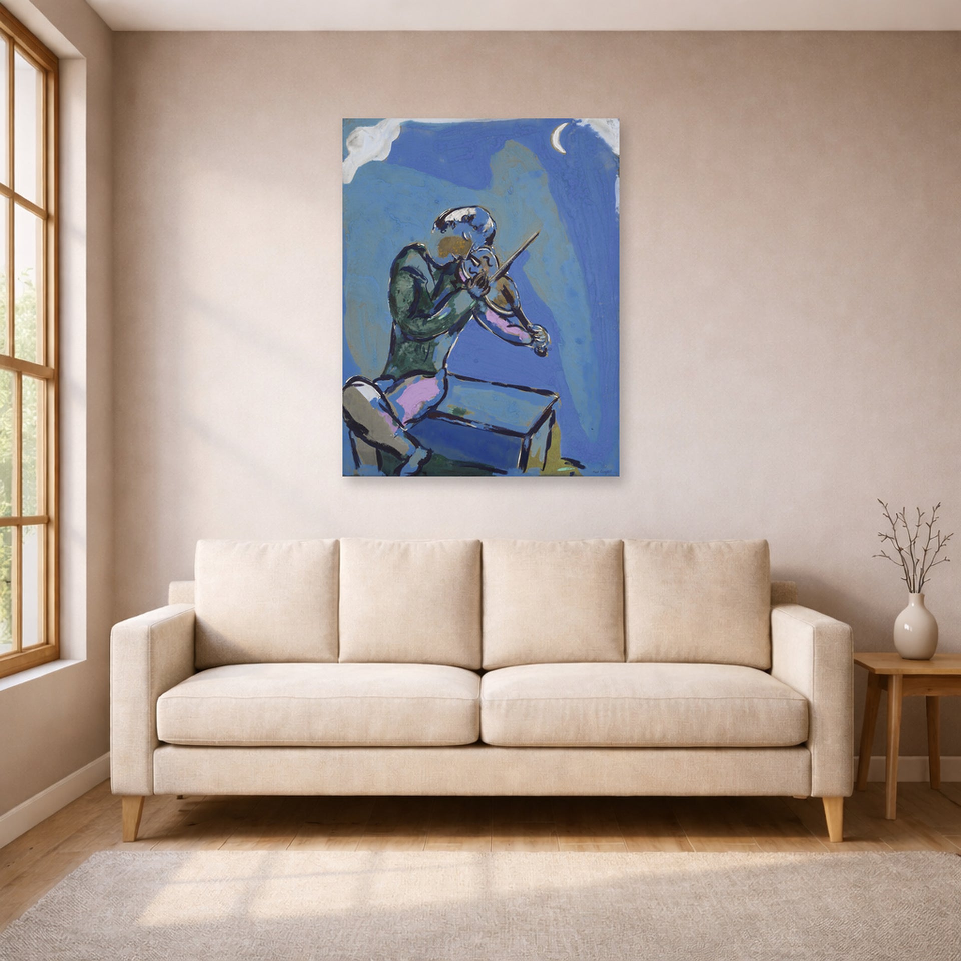 Unframed poster print of Marc Chagall's Le Violoniste Bleu displayed on a wall in a living room