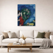 Gallery-wrapped canvas print of Marc Chagall's Les Amoureux Au Bouquet displayed on a wall in a living room