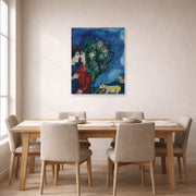 Unframed poster print of Marc Chagall's Les Amoureux Au Bouquet displayed on a wall in a dining room