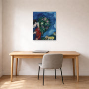 Unframed poster print of Marc Chagall's Les Amoureux Au Bouquet displayed on a wall in an office