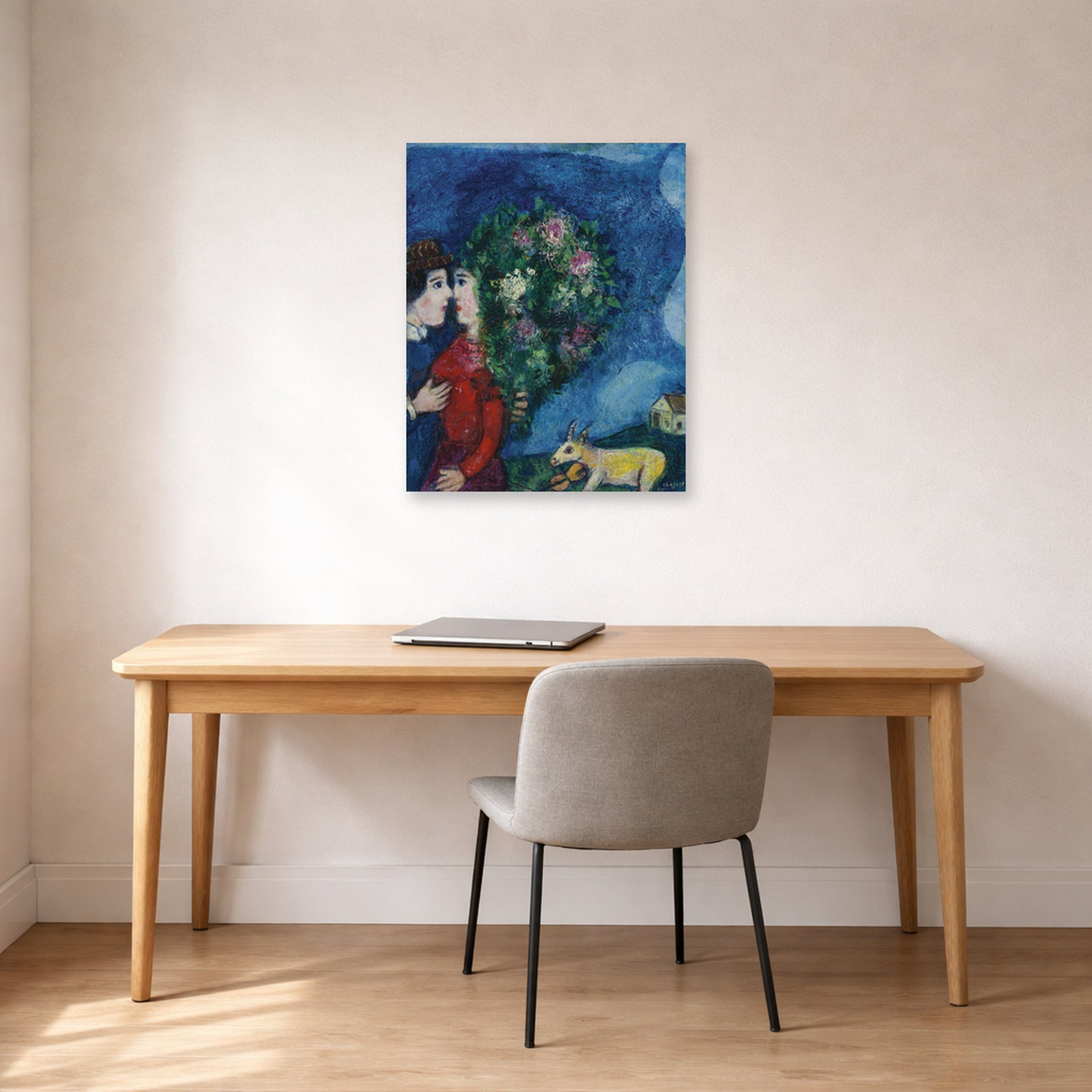 Unframed poster print of Marc Chagall's Les Amoureux Au Bouquet displayed on a wall in an office