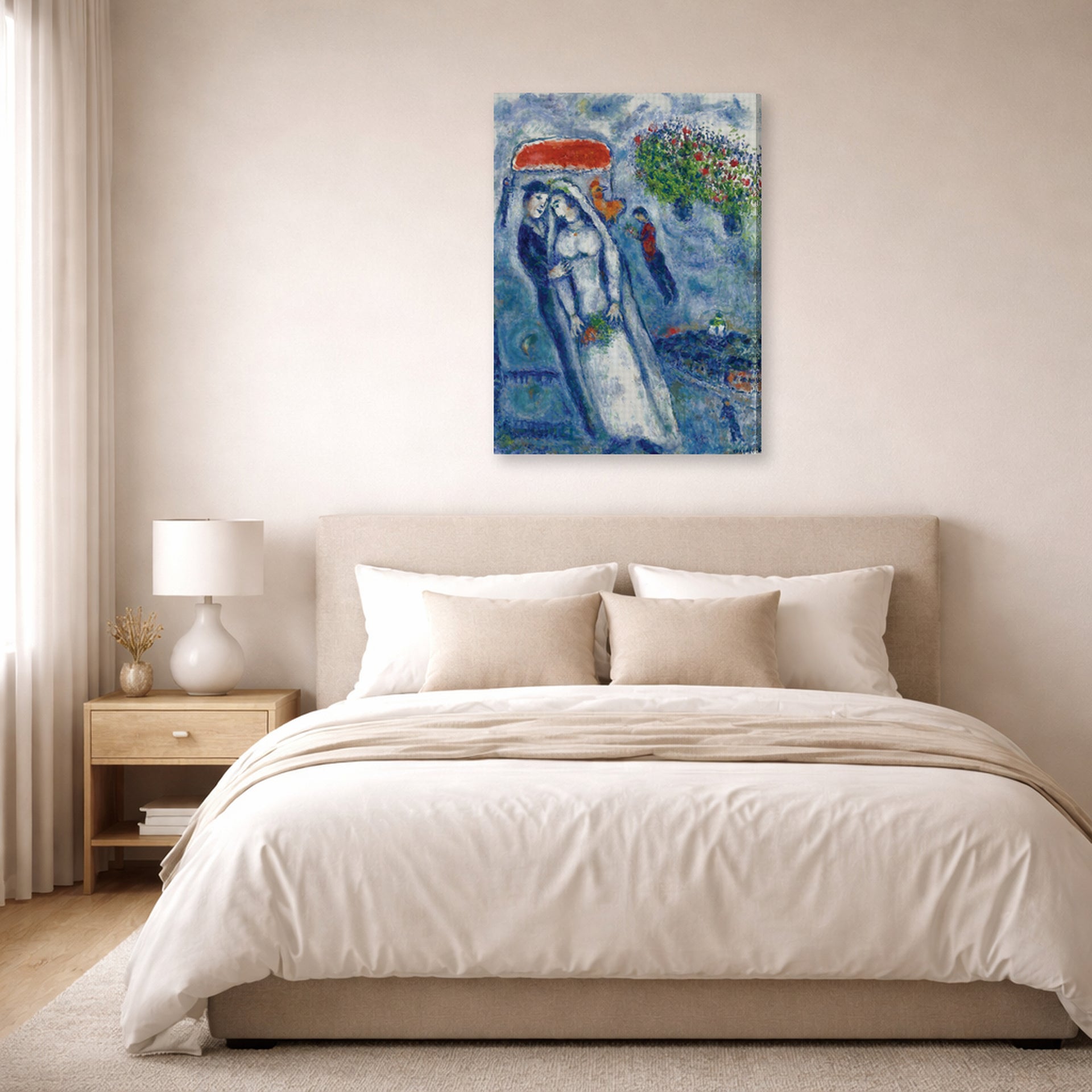 Gallery-wrapped canvas print of Marc Chagall's Les Mariés Sur Fond Bleu displayed on a wall in a bedroom