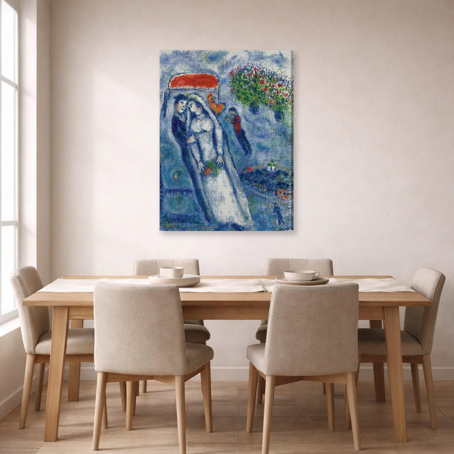 Gallery-wrapped canvas print of Marc Chagall's Les Mariés Sur Fond Bleu displayed on a wall in a dining room