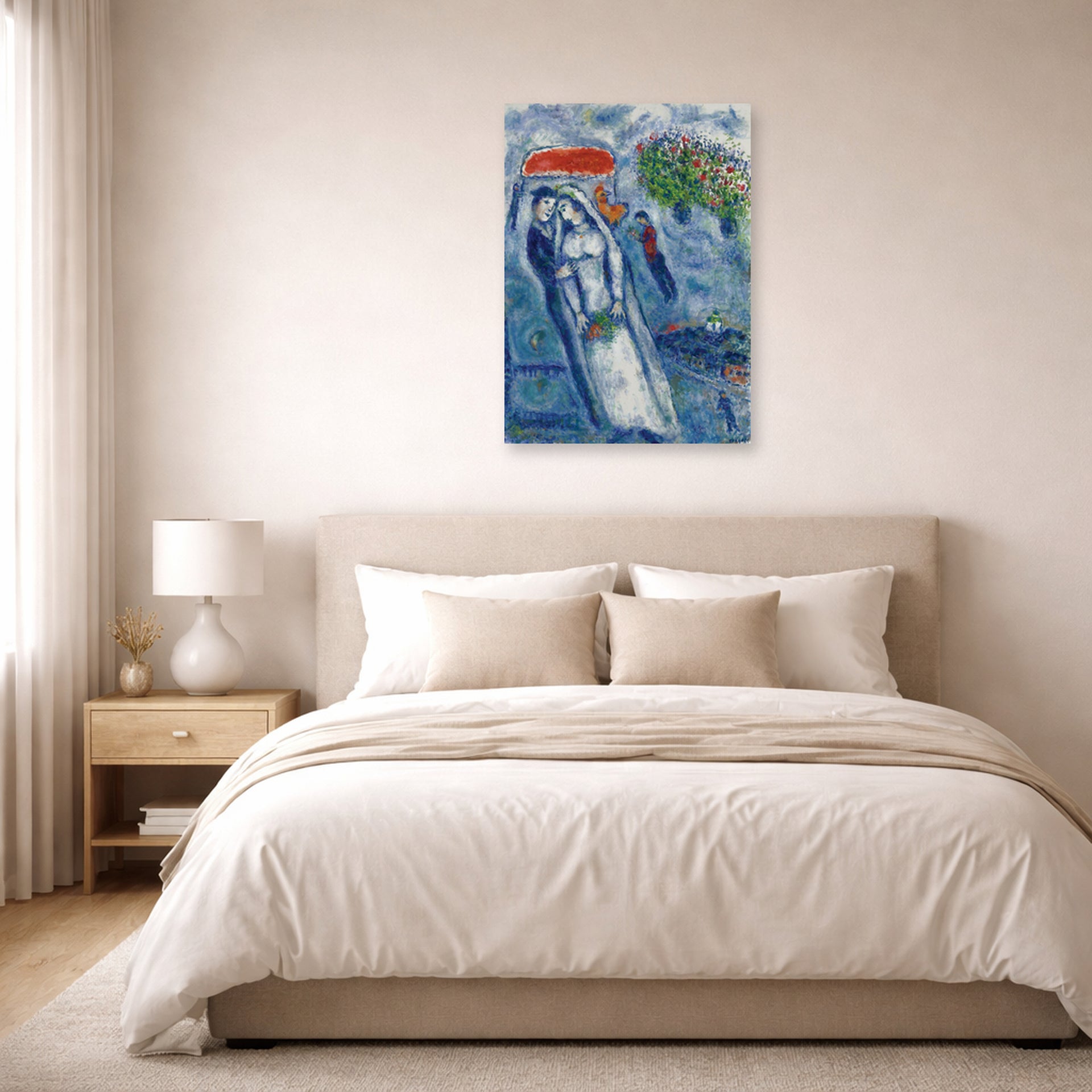 Unframed poster print of Marc Chagall's Les Mariés Sur Fond Bleu displayed on a wall in a bedroom
